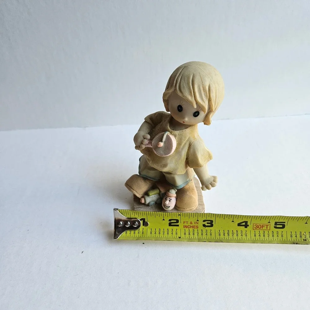 Vintage Style Boy Playing Paddle Ball Resin Figurine Collectible Home Decor